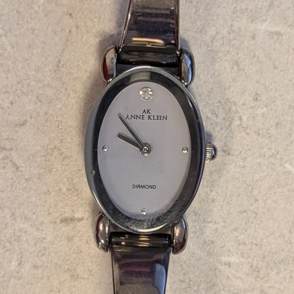 WORKING woman's Gruen By Embassy Silver Tank Black Band Cuff Watch